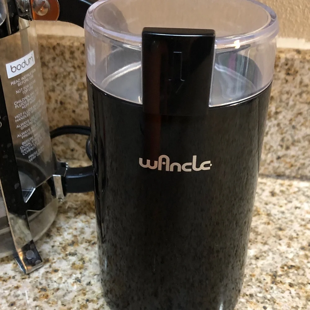 Black Electric Coffee Grinder with French Press and Orange Travel Mug
